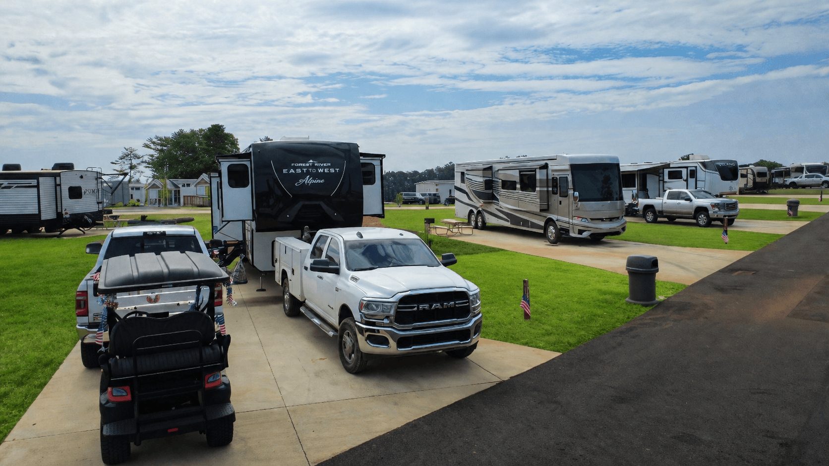 RVs and tailgaters filling the full-hookup sites at Carolina Camp Cedar, a Clemson football gameday basecamp